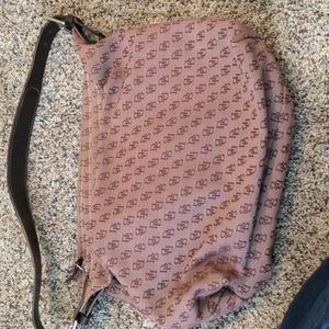 Dooney and Bourke purse. Burgundy cloth with leather strap